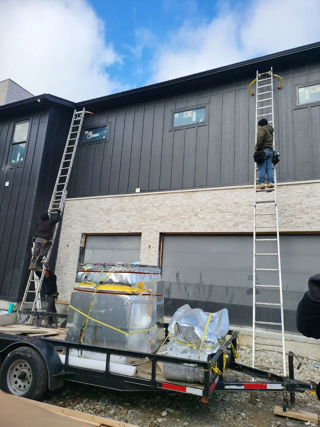 Siding installation documented in The Hawthorns